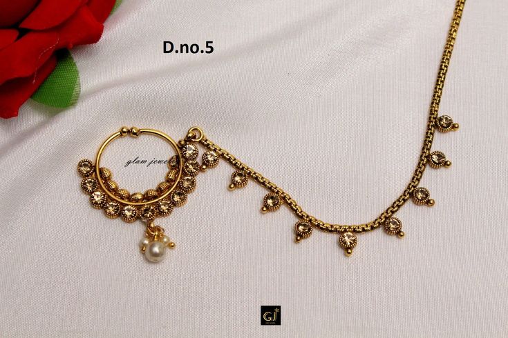 Indian non pierced nose ring nath chain for bridal wedding. Hoop size (Diameter) : D.no. 1= 1.6 inch inner diameter, 2.1 inch (outer diameter) for left nose side. D.no. 2= 0.6 inch inner diameter, D.no. 3= 1.7 inch inner diameter, 2.2 inch (outer diameter) for left nose side. D.no. 4= 0.9 inch inner diameter, 1.2 inch (outer diameter) for left nose side. D.no. 5= 0.9 inch inner diameter, 1.3 inch (outer diameter) for left nose side. D.no. 6= 0.7 inch inner diameter, 1 inch (outer diameter) for l Festive Chandbali Nose Ring For Weddings, Adjustable Traditional Nose Rings For Wedding, Wedding Chandbali Nose Ring, Tilla Nose Rings For Wedding Festivities, Festive Wedding Nose Ring With Tilla, Gold Chandbali Nose Rings Bollywood Style, Chandbali Nose Rings For Wedding And Festivals, Temple Jewelry Chandbali Nose Rings For Wedding, Elegant Chandbali Nose Rings For Wedding