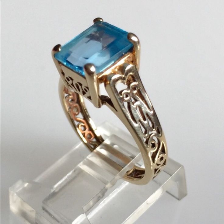 10k Yellowgold Filigree Blue Topaz Ring Emerald Cut Blue Topaz - 9mm X 7mm 3.1g Ring Size 6 Engagement Wishes, Ring Emerald Cut, Ring Emerald, 6 Rings, Ring Color, Blue Topaz Ring, Topaz Ring, Gold Yellow, Womens Jewelry Rings