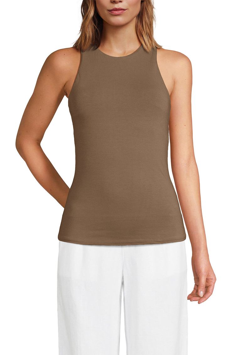 Made with double layer lightweight jersey knit fabric withLYCRAADAPTIV fiber for a smoothing appearance, this tank is comfortable and moves with you. The crew neck makes it versatile to wear with anything, and the fitted style makes it feel a little more elevated. Plus, it's so easy to layer over on cool summer nights. It even has a built in shelf bra with removable bra cups, so you can wear it your way. Take it from us, this tank is a total must-have for warmer weather ahead." Compressive Fit: Summer Elastane Tank Top For Everyday Wear, Summer Everyday Elastane Tank Top, Everyday Summer Elastane Tank Top, Versatile Fitted Crew Neck Tank Top, Seamless Tops With 4-way Stretch For Spring, Fitted Crew Neck Tank Top, Fitted Modal Tank Top For Summer, Fitted Modal Casual Tank Top, Seamless 4-way Stretch Top With Tank Straps