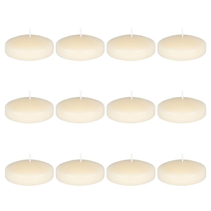 eight candles are arranged in rows on a white background