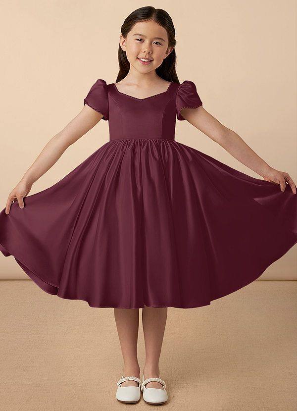 Juno is our sweet and classy matte satin dress. She features adorable puff sleeves, a sweetheart neckline, a A-line skirt, and a beautiful bow at the back of the dress. Satin Bridesmaid Dress With Ruched Bodice And Sweetheart Neckline, Elegant Dresses With Pleated Bodice For Dress-up, Elegant Dresses With Pleated Bodice For Formal Occasions, Party Princess Dress With Fitted Bodice In Satin, Elegant Fitted Princess Dress, Elegant Wedding Princess Dress, Short Sleeve Princess Dress For Party, Elegant Short Sleeve Princess Dress For Dress-up, Princess Dress With Short Sleeves For Party