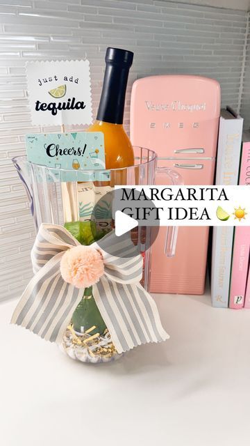 the margarita gift idea is displayed in front of books and magnets on a counter