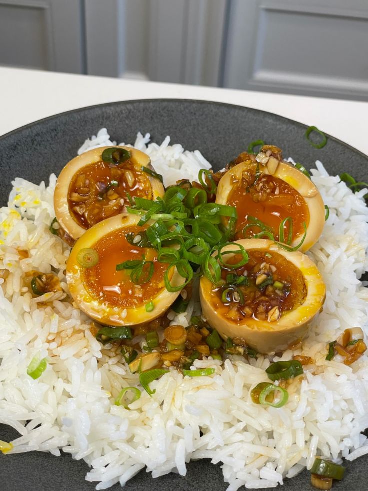 an image of food on a plate with rice