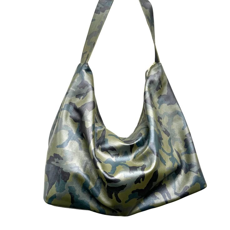 All our bags are made to order. Production time is 3-5 business days, up to 7 days for custom orders.  Soft, slouchy leather hobo bag, extra  large shoulder bag in camouflage leather with brass top zipper, black lining.  FUNCTIONALITY:         *       Super spacious and durable to be used as a everyday bag         *       Fits all size laptops, 17" fills the whole bag + room for a couple of books , wallet         *Over the shoulder long leather strap to wear over layers super durable. *Large int Reversible Hobo Shoulder Bag For Travel, Reversible Hobo Bag For Travel, Reversible Shoulder Bag For Errands, Reversible Crossbody Hobo Bag For Everyday Use, Everyday Reversible Crossbody Hobo Bag, Reversible Leather Tote Shoulder Bag, Leather Reversible Tote Bag, Reversible Hobo Shoulder Bag For Everyday Use, Reversible Leather Bag For On-the-go