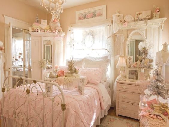 a bedroom decorated in pink and white