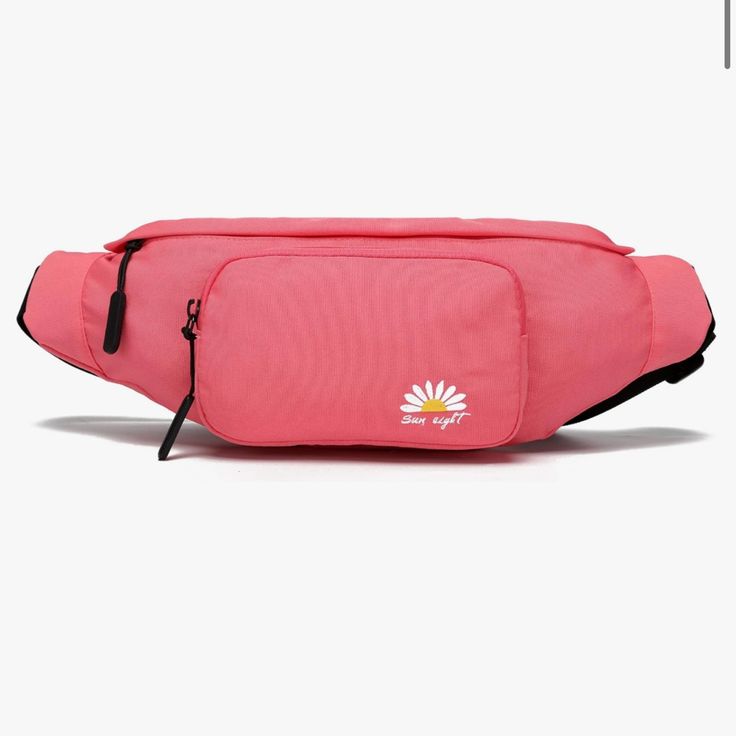 a pink fanny bag sitting on top of a white surface