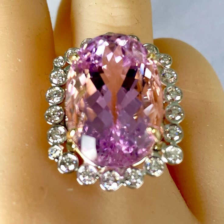 This is part of Chairish’s Fine Jewelry assortment.  Introducing the Kunzite 28.14 Diamonds 1.60 Carat 18 Karat Yellow and White Gold Ring (Size 6):  Head measuring 0.90 inch width by 1.10 inch length  Elevate your style with this exquisite and elegant Kunzite ring, featuring a stunning combination of precious gemstones and high-quality gold. Crafted to perfection, this ring is a testament to timeless beauty and luxury. Kunzite Centerpiece: The focal point of this ring is a magnificent 28.14 car Formal Pink Diamond Ring In Platinum, Luxury Pink Diamond Ring For Formal Occasions, Luxury Pink Gemstones For Wedding, Pink Gia Certified Diamond Ring For Formal Occasions, Formal Pink Gia Certified Diamond Ring, Luxury Pink Amethyst Ring For Formal Occasions, Formal Gia Certified Pink Gemstones, Pink Gemstones For Formal Fine Jewelry, Formal Pink Diamond Ring With Gemstone