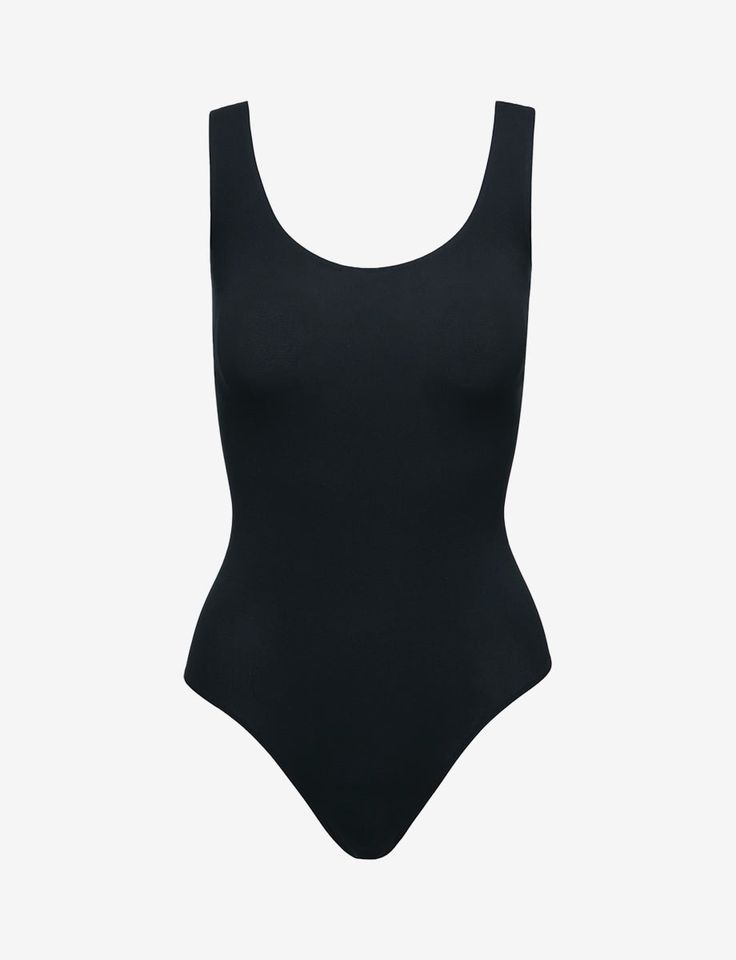 There are endless reasons to love our Ballet Tank Bodysuit. With its flattering neckline and seamless and stay-tucked fit, you'll wear this style again and again. This one-size wonder is made from a luxe European microfiber blend that's ultra soft and stretchy. Product Details Luxury microfiber blend (87% nylon, 12% elastane, 1% cotton) Fit-tested by real women Seamless construction High stretch and recovery One size fits most Superior body contouring Snap gusset closure Machine washable Item KT Black Leotard, Bodysuit Tops, Turtleneck Bodysuit, Tank Bodysuit, Body Suit Outfits, Sleeveless Turtleneck, Shoes Heels Wedges, Jennifer Fisher, Clothing Essentials