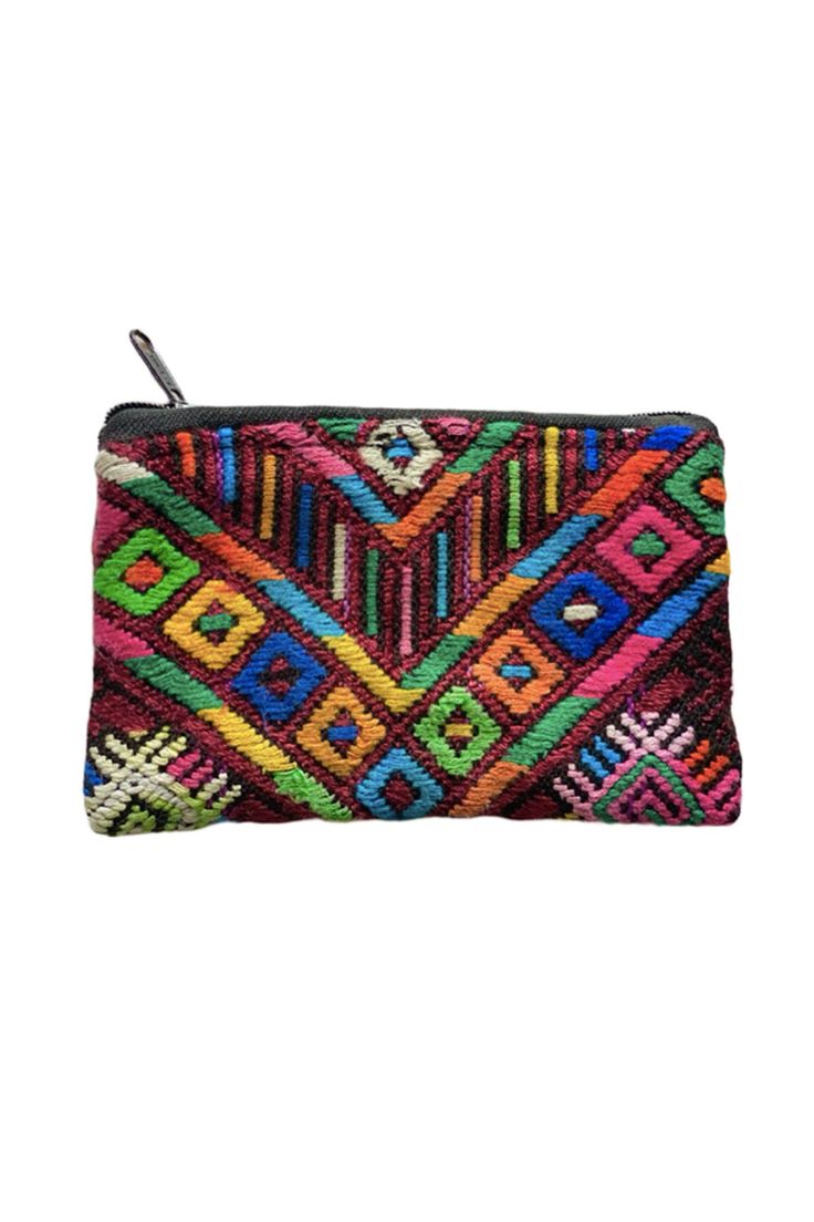 Vintage Textile Chiquita Chi Chi Pouch SM25 We give all the credit for these exquisite pouches to our very own bag maker in Guatemala, Irma Marisol. She and her husband take the most beautiful vintage Mayan textiles and huipiles and hand make these gorgeous one of a kind pouches that can be used as a coin purse, wallet or anything your heart desires. We are in love with each one as they all tell a story through their exquisite embroidered textile. Some have bold colors while others have bold pat Bohemian Multicolor Clutch With Zipper Pouch, Artisan Multicolor Clutch As A Gift, Multicolor Coin Purse With Removable Pouch As Gift, Gift Coin Purse With Removable Pouch In Multicolor, Gift Multicolor Coin Purse With Removable Pouch, Artisan Multicolor Rectangular Clutch, Bohemian Rectangular Cosmetic Bag With Zipper, Bohemian Style Rectangular Cosmetic Bag With Zipper, Multicolor Pouch Cosmetic Bag As Gift