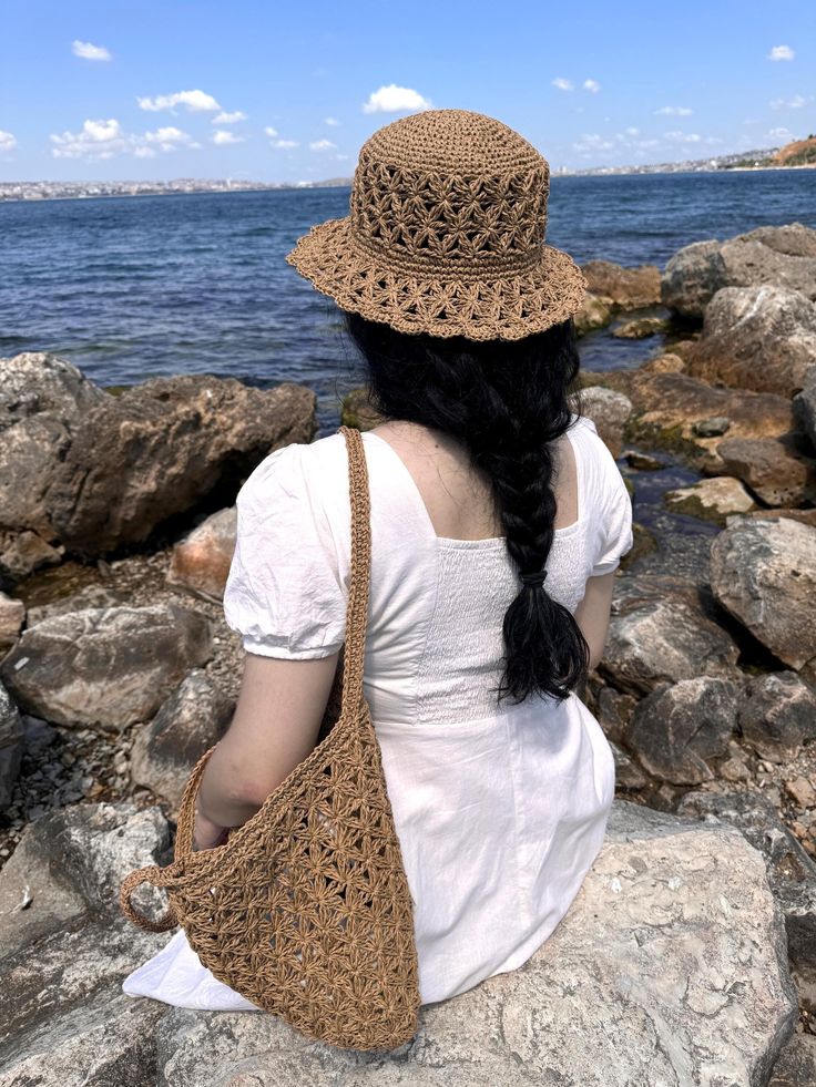 Handmade crochet paper rope hat is comfortable, flexible and lightweight. It will complete your elegance on summer days and protect you from the sun.  This handicrafted hat from environmentally friendly material, will be a great gift for your loved ones. ✔️METARIAL ✮Paper rope/Raffia rope ✔️DIMENSIONS ✮Take your head measurement as shown in the last picture ✮You can choose the size from the size option or write me in a note. ✔️CARE INSTRUCTIONS ✮Brush off dust or soil with soft brush  ✮Spot clea Straw Crochet Hats, Wide Brim Cotton Yarn Crochet Hat For Vacation, Vacation Crochet Hat With Short Brim, Lightweight Casual Crochet Hat With Paper Straw, Curved Brim Crochet Cotton Hat For Vacation, Lightweight Casual Crochet Hat In Paper Straw, Casual Lightweight Crochet Hat In Paper Straw, Curved Brim Crochet Hat In Cotton Yarn For Vacation, Vacation Crochet Hat With Curved Brim