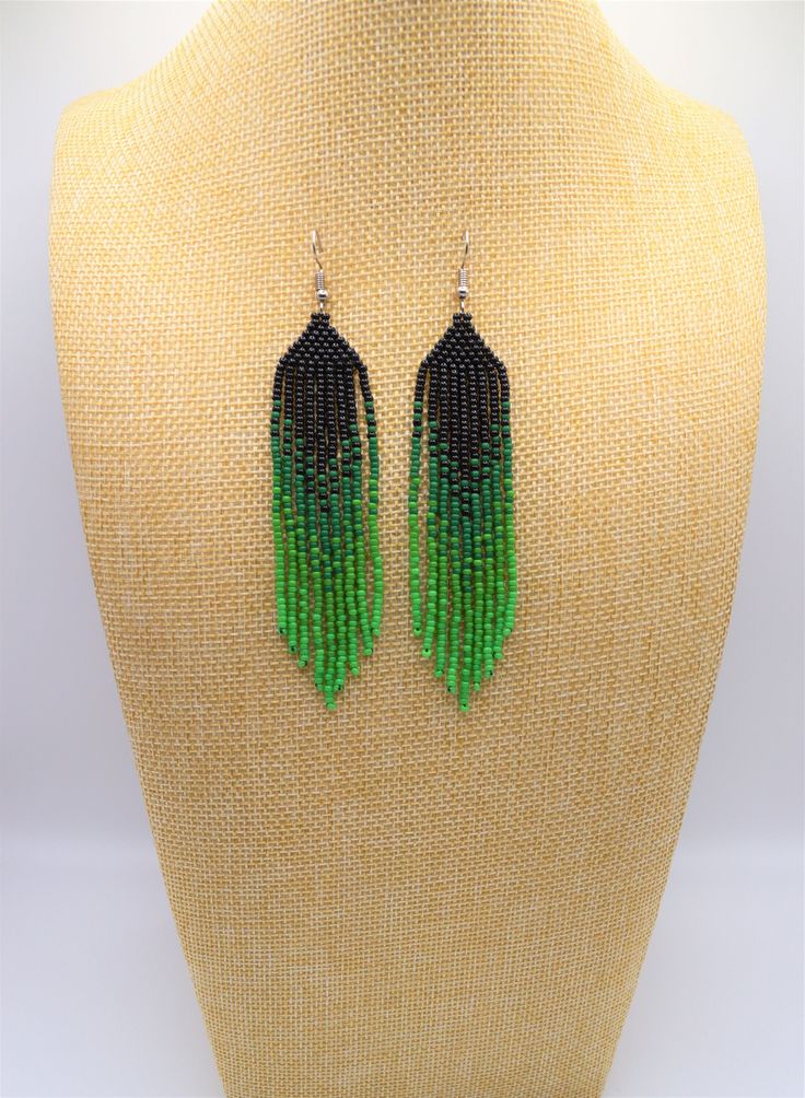 Green Beaded Fringe Chandelier Earrings, Green Beaded Long Drop Jewelry, Green Teardrop Beaded Earrings With Dangling Beads, Green Teardrop Earrings With Tiny Beads, Green Fringe Round Bead Earrings, Green Fringe Beaded Drop Earrings, Green Fringe Dangle Jewelry, Green Beaded Tassel Earrings With Round Beads, Green Teardrop Beaded Earrings With Tiny Beads