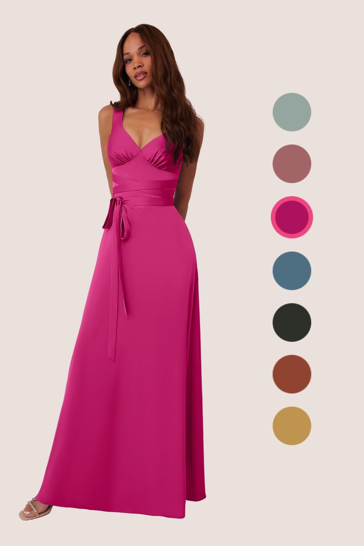 This floor length dress features v-necklines, wrap around belt, and a drop waist. V-neck Maxi Dress With Tie Back And Fitted Bodice, V-neck Bridesmaid Wrap Dress, V-neck Bridesmaid Dresses With Tie Waist, Solid V-neck Bridesmaid Maxi Dress, Belted V-neck Wedding Dress, Wedding Dress With Tie Waist And V-neck, V-neck Wedding Dress With Tie Waist, V-neck Tie Waist Dress For Wedding, V-neck Tie Back Maxi Dress