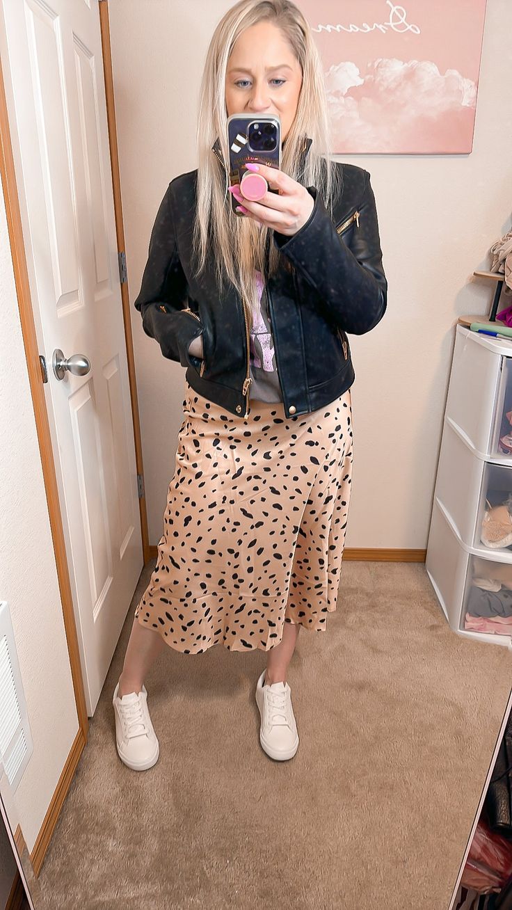 Satin Leopard Print Midi Skirt w/ elastic waistband Chic skirt perfect for spring - great with tennis shoes or boots! Perfect To dress up or down. Model is in size Medium - 28 waist - runs a little small Trendy Non-stretch Skirt For Spring, Casual Long Stretch Skirt, Trendy Non-stretch Skirt For Fall, Winter Casual Non-stretch Skirt, Trendy Pleated Skirt For Spring, Casual Midi Skirt For Winter, Casual Non-stretch Skirt For Spring, Trendy Long Skirt For Fall, Black Casual Skirt For Fall