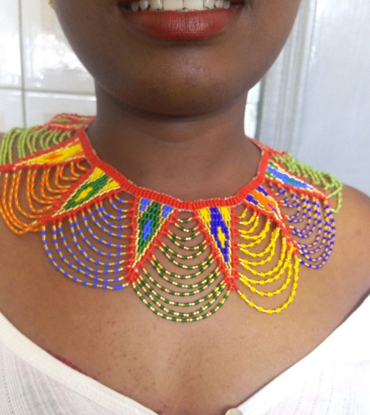 African wedding necklace, Zulu necklace, Beaded shawl necklace, African jewelry, Masai necklace, Bridesmaid necklace, Wedding gift This stunning necklace is superbly crafted with fine beads. The necklace can be worn with any outfit at different occasions and it will absolutely makes you stand out. 100% handmade using fine beads. Closure: ball joint Color: multicolor 3-5 days delivery via DHL Express The shipping fee is for the first item only and additional necklaces or items ship for free. Whol Multicolor Beaded Choker For Wedding, Bohemian Colorful Beads For Wedding, Wedding Multicolor Beaded Chain Beads, Multicolor Handmade Choker For Wedding, Bohemian Multicolor Beaded Necklaces For Wedding, Bohemian Multicolor Beaded Necklace For Wedding, Multicolor Beaded Chain Necklace For Wedding, Bohemian Beaded Necklaces With Large Beads For Weddings, Multicolor Beaded Necklace For Wedding