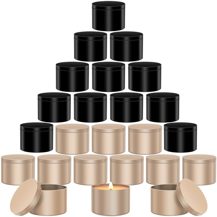 a pyramid made out of black and gold containers with candles in them on a white background