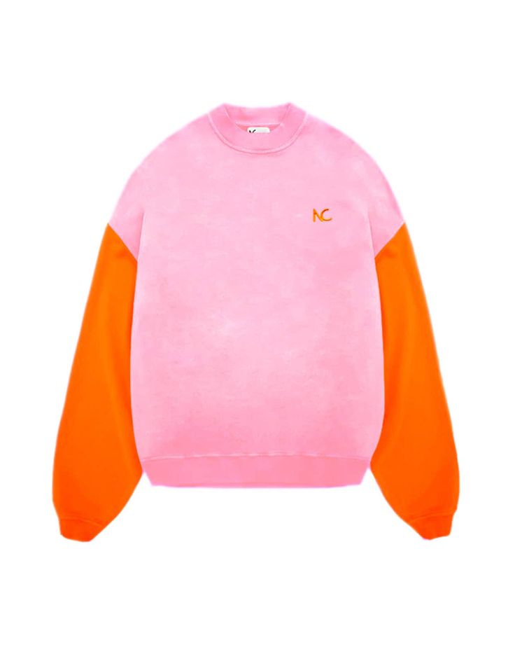 The NC Oversized Sweater in pink and orange is crafted from cotton & polyester featuring a round neck, long wide sleeves, and a relaxed fit. Unisex. Made in Spain. Composition: 60% Cotton, 40% Polyester. Interior quality cotton fleece for a softer feel. Measurements: S: LENGTH: 73.2cm / WIDTH: 60cm M: LENGTH: 78,6cm / WIDTH: 71cm Oversized Color Block Sweatshirt For Fall, Relaxed Fit Color Block Sweater With Crew Neck, Relaxed Fit Color Block Crew Neck Sweater, Oversized Multicolor Sweatshirt For Loungewear, Orange Crew Neck Sweater With Ribbed Cuffs, Orange Ribbed Cuff Crew Neck Sweater, Trendy Multicolor Oversized Sweatshirt, Spring Color Block Crew Neck Sweatshirt, Casual Pink Sweater With Ribbed Cuffs