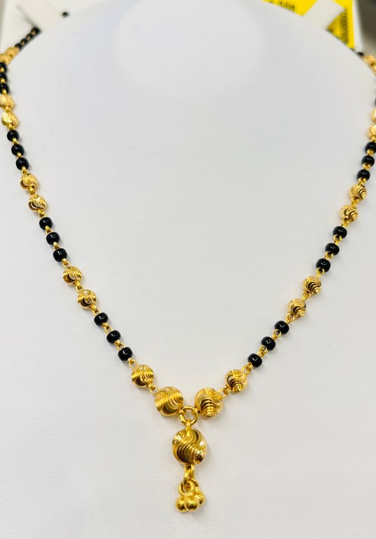 Black beads chain necklace, 916 Yellow Gold GOLD PURITY : 916 gold purity Weight: 9.94 grams Size : 16-18 inches Length Colour : YELLOW GOLD Hallmark: Hallmarked 916 stamp Hook: '' fish hook clasp Design : Mangalsutra necklace with black beads. Authentic 916 Gold by Mbrilliance FAQs Q: Is it real gold? A: yes it's real authentic genuine 916 gold Q: can pawn? A: yes it's pawnable ⭐️GoForGold⭐️ Single Black Beads Chain, 22k Yellow Gold Necklaces With Polished Beads, 22k Gold Beaded Chain Necklace As Gift, 22k Gold Beaded Chain Necklaces For Gift, 22k Gold Beaded Chain Necklace For Gift, 22k Gold Necklace With Beaded Chain For Gift, 22k Gold Round Beads Yellow Necklace, Yellow 22k Gold Necklaces With Round Beads, 22k Gold Necklaces With Round Beads For Celebration