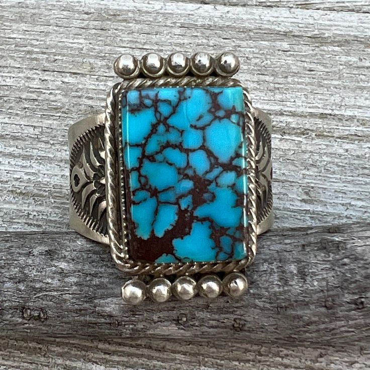 Sterling silver with Kingman turquoise  The top of the ring measures about 1" x 5/8"  Ring size 11  Handmade by Navajo artist, Adrienne Gordon, signed and marked sterling  Close up photos have been taken.  Some items may appear larger than they actually are.  Please take the time to review the photos and measurements before purchasing.    Exported By ExportYourStore :) SKU:457252123772_65C9* One Of A Kind Artisan Rectangular Jewelry, One Of A Kind Rectangular Artisan Jewelry, Artisan One-of-a-kind Rectangular Jewelry, Artisan Turquoise Rectangular Jewelry, Rectangular Sterling Silver Jewelry With Inlay, Handmade Southwestern Rectangular Jewelry, Southwestern Handmade Rectangular Jewelry, Collectible Blue Turquoise Inlay Ring, Rectangular Turquoise Jewelry For Collectors