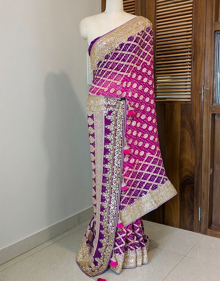 Saree With Zari Weaving For Reception And Transitional Seasons, Navratri Traditional Wear With Gota Work For Receptions, Traditional Wear With Gota Work For Navratri Reception, Traditional Wear For Reception With Gota Work During Navratri, Banarasi Silk Choli With Gota Work For Reception, Reception Choli With Gota Work In Banarasi Silk, Reception Banarasi Silk Choli With Gota Work, Traditional Purple Sharara With Gota Work, Reception Banarasi Silk Traditional Wear With Gota Work