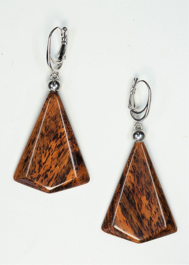 The earrings are one of a kind and handmade from Bocote wood and have very smooth and brilliant cut  surface. Lever backs are Rhodium  plated. Care instructions: Avoid direct contact with perfumes, alcohol, water and other solvents that may damage wood finish. Wipe jewelry with soft dry cloth. Brown Teardrop Wood Jewelry, Brown Wooden Drop Earrings, Brown Wood Drop Earrings, Modern Brown Earrings For Gift, Modern Brown Drop Earrings, Brown Wooden Earrings For Pierced Ears, Brown Teardrop Earrings For Formal Occasions, Brown Wooden Dangle Jewelry, Formal Brown Teardrop Earrings