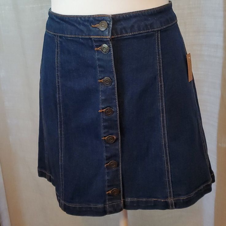 Denim Mini Skirt. Buttons All The Way Up. Brand New With Tags. Dark Wash Button Skirt For Summer, Fitted Button-up Denim Mini Skirt, Summer Dark Wash Mini Skirt With Button Closure, High Waist Dark Wash Skirt With Buttons, High-waist Dark Wash Skirt With Buttons, Summer Mini Skirt With Button Closure In Dark Wash, Fitted Denim Blue Skirt With Buttons, Fitted Button-up Denim Skirt, Casual Denim Blue Skirt With Button Zip Fly