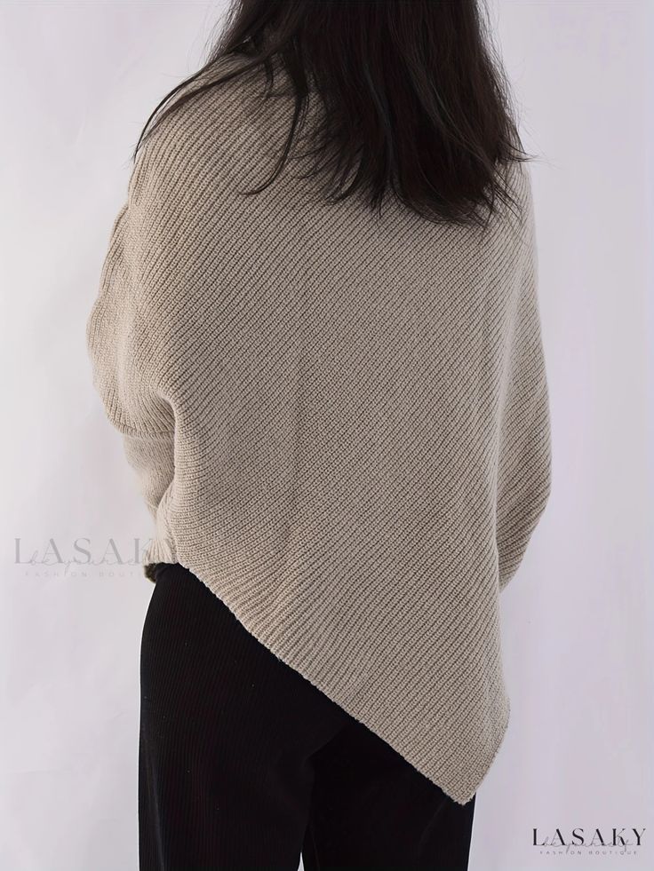 Lasaky - Fall-Winter Womens Clothing: Elegant Batwing Sleeve Sweater with Asymmetrical Hem and Turtle Neck Design Asymmetrical Sweater For Winter, Solid Color Winter Poncho For Layering, Winter Layering Poncho, Solid Poncho For Winter Layering, Elegant Asymmetrical Sweater For Winter, Beige Wrap Poncho For Winter, Batwing Sleeve Sweater, Elegant Fabric, Asymmetrical Hem