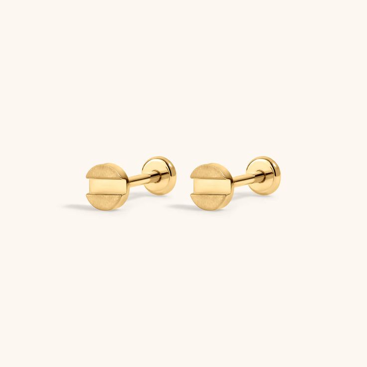 the gold stud earrings are made from brass, and have round posts on each side