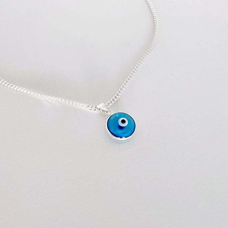 Evil Eye Necklace, Tiny Cross and Evil eye with Birthstone, Sterling Silver Evil Eye Jewelry- Protection, Friends great Gift. Most popular evil eye. Cast using 100% sterling silver, no pewter, nickel or lead was used to create this piece, buy with peace of mind.  ☮  ツ  Big collection evil eye this link  http://etsy.me/1EPVeWx  More Meaningful, Symbolic Jewelry? http://etsy.me/16So5MK  Need initials, birthstones, charms,  etc., or express shipping? Please follow :) http://etsy.me/10D9H8j FEATURE: Sterling Silver Evil Eye Bracelet As Gift, Silver Charm Necklace With Evil Eye Pendant, Silver Evil Eye Charm Necklace With Round Pendant, Handmade Sterling Silver Evil Eye Bracelet, Sterling Silver Charm Necklace With Evil Eye Round Pendant, Sterling Silver Evil Eye Charm Necklace, Sterling Silver Evil Eye Bracelet, Necklace Evil Eye, Eye Round