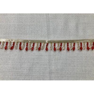 red and white beaded trim on fabric