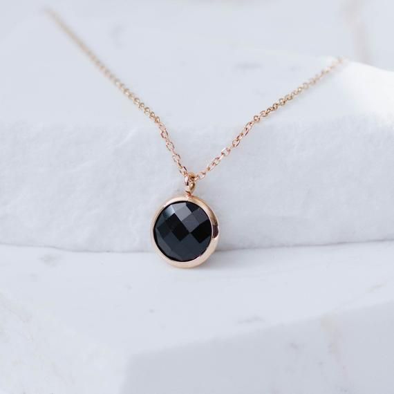 Dainty black onyx necklace in 14K solid gold. Simple and dainty necklace for women who love colors. The best Mother's DayDay gift. 100% handcrafted with love! PRODUCT DETAILS● Material: 14K solid gold - white gold - rose gold● Gemstone: Black onyx, round briolette cut ● Stone Diameter: 10mm (0.4in)● Length: 39cm (15.5in) to 45cm (17.5)HOW TO ORDER - CUSTOM ORDERS●Choose from the drop down menus the available options (Metal, Length) and leave us a note for any special requirements.●For special or Black Jewelry With Delicate Chain, Black Jewelry With Delicate Round Chain, Black Necklace With Delicate Chain And Round Pendant, Dainty Black 14k Gold Necklace, Black Birthstone Necklace For Anniversary, Black Birthstone Necklaces For Anniversary, Black Necklaces With Birthstone For Anniversary, Black Clavicle Chain Charm Necklace, Minimalist Black 14k Gold Necklace