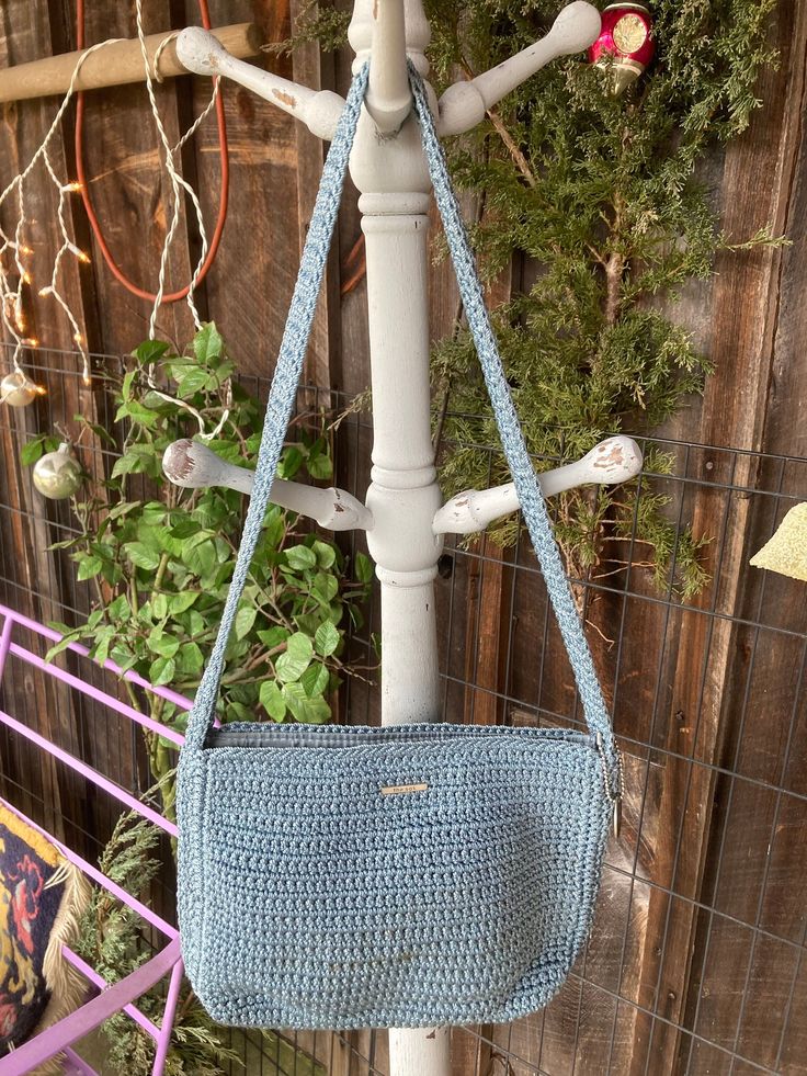 "The Sak Crochet Elegant Light Blue   Shoulder Bag / Purse, 11\"W X 7.5\" H, 13\"H Strap , zipper opening front , inside  zipper opining ,blue lining .Perfect size for cell phone, make-up bag, change purse. No wear but bottom of the bag end the side has with little greenish color. Other than that I would say very good.please email us with your questions. Thank you for looking." Light Blue Pouch Shoulder Bag For Travel, Light Blue Crossbody Shoulder Bag For On-the-go, Light Blue Shoulder Bag With Zipper For Daily Use, Light Blue Bags With Zipper Pouch For Everyday Use, Light Blue Travel Bag With Zipper Pouch, Light Blue Zipper Pouch Bag For Travel, Everyday Light Blue Shoulder Bag With Zipper, Blue Pouch Shoulder Bag With Zipper Pocket, Casual Blue Bag With Zipper Pouch