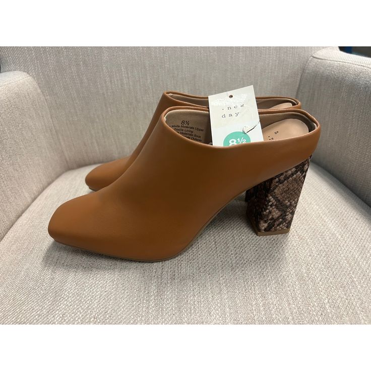 These Mules Are Brand New With Tags. Brown Pointed Toe Mules With 4-inch Heel, Brown Pointed Toe Mules With Wrapped Heel, Brown Faux Leather Heels For Office, Synthetic Mules With 4-inch Heel For Work, Workwear Mules With 4-inch Heel In Synthetic Material, Workwear Mules With 4-inch Heel In Synthetic, Workwear Mules With 4-inch Heel And Synthetic Material, Formal Brown Mules With Wrapped Heel, Formal Brown Faux Leather Heels