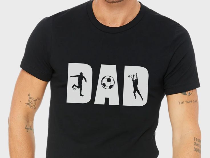 This shirt makes the perfect gift for your favorite soccer playing dad, the dad of a soccer player, or any soccer fan dad! .: 100% Airlume combed and ringspun cotton (fiber content may vary for different colors) .: Light fabric (4.2 oz/yd² (142 g/m .: Retail fit .: Tear away label .: Runs true to size Please double check the size chart for sizing! Thank you for supporting my small business! Black Team Spirit T-shirt For Father's Day, Father's Day Black T-shirt With Team Name, Papa Football Shirts, Sporty T-shirt For Sports Events And Father's Day, Black T-shirt For Game Day On Father's Day, Father's Day Sports Event T-shirt With Name Print, Fan Apparel T-shirt For Game Day On Father's Day, Sporty Black T-shirt For Father's Day, Black Sporty T-shirt For Father's Day