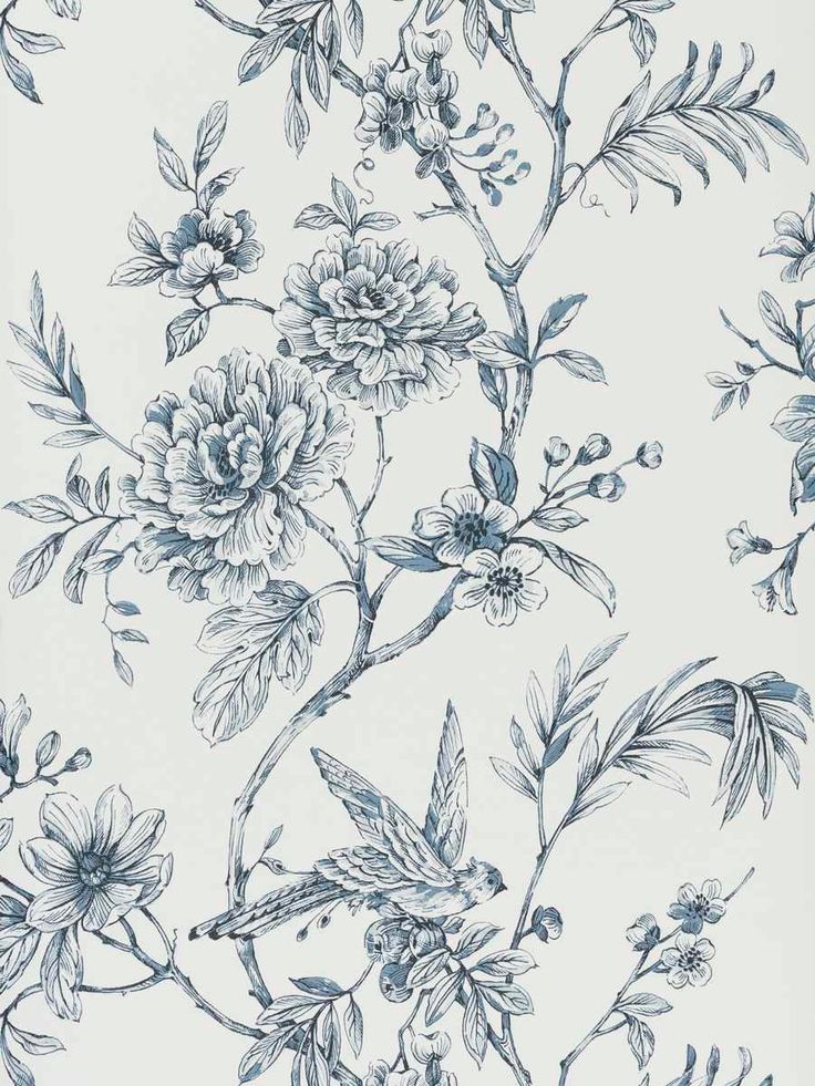 a blue and white wallpaper with flowers on it