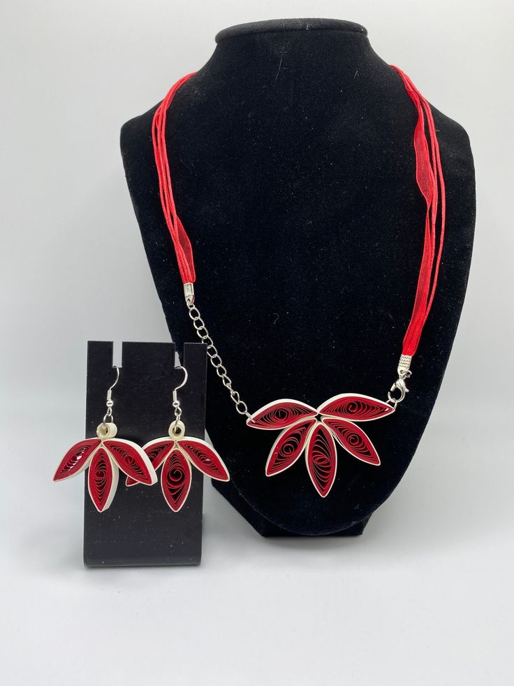 "You're looking at Quilling Unique Paper Quilling Necklace and Earrings set, Jewelry, floral red, Valentines Gift A unique handmade paper quilled Necklace and earrings . Give your loved one a special gift with this beautiful set which are made using the ancient art of quilling. This is where one uses strips of paper which are rolled, shaped, and glued into decorative designs. These sets would be perfect for a special occasion like as : Birthday, Valentine's Day, Mother's Day, Wedding, anniversar Quilling Rose, Quilling Necklace, Quilled Jewellery, Quilling Earrings, Jewelry Floral, Set Jewelry, Paper Jewelry, Necklace And Earrings Set, Paper Quilling