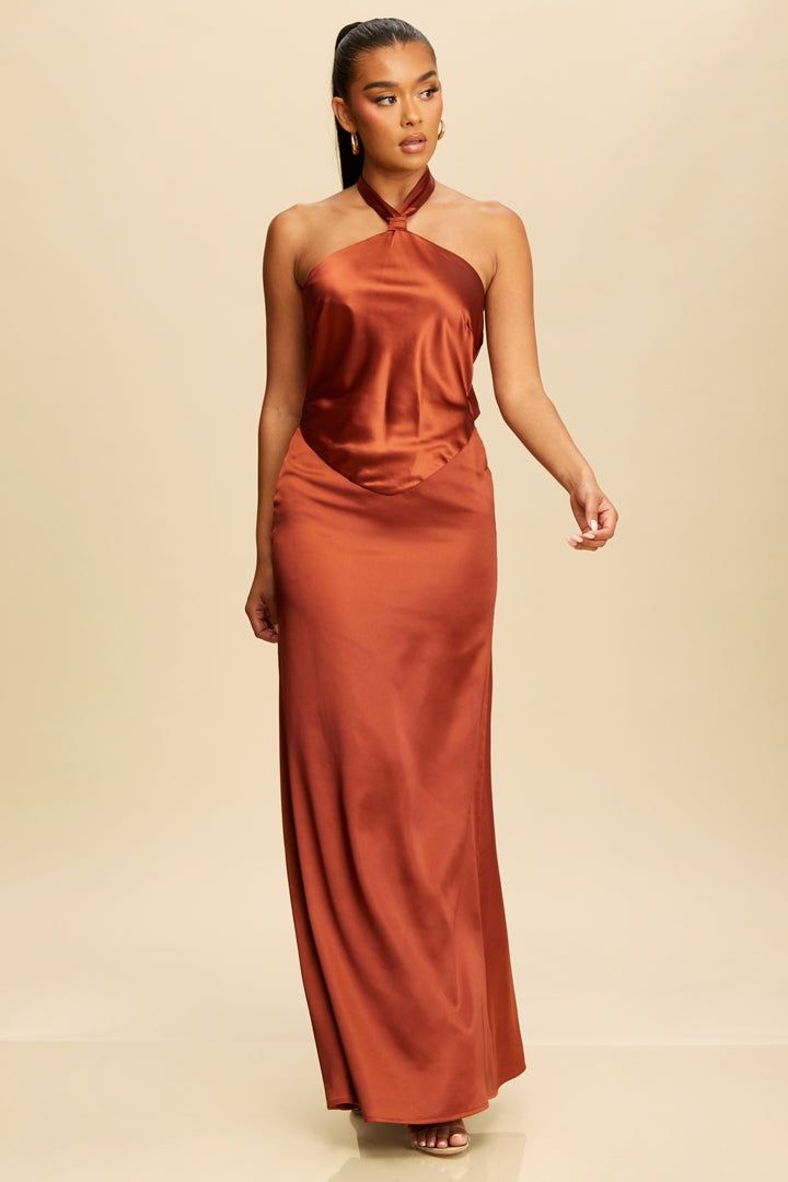 Indulge in effortless elegance with our Graceful Tie Halter Maxi Dress. Crafted from luxurious fabrics, this dress features a flattering tie halter neckline and a flowy maxi silhouette. Perfect for any special occasion, this dress will make you feel like a true fashion icon. Self: 98%Polyester 5%Spandex Lining: 100%Polyester Silk Halter Neck Evening Dress, Silk Halter Dress With Tie Back For Formal Occasions, Silk Halter Dress With Tie Back For Formal Events, Formal Silk Halter Dress With Tie Back, Silk Halter Neck Maxi Dress With Tie Back, Elegant Halter Neck Maxi Dress With Tie Back, Silk Halter Maxi Dress For Wedding, Formal Halter Neck Midi Dress With Tie Back, Silk Halter Neck Backless Wedding Dress