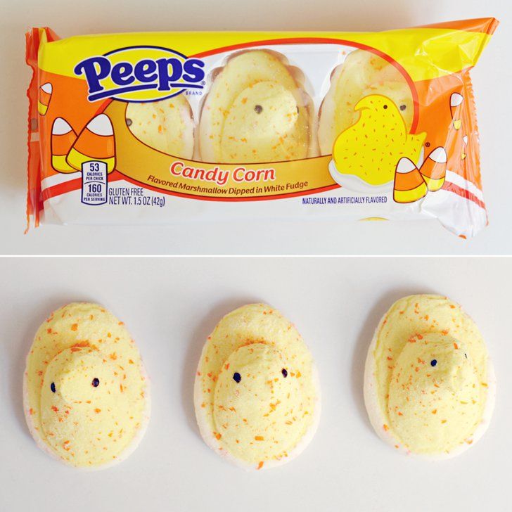 three candies in the shape of smiley faces and one with peeps candy corn