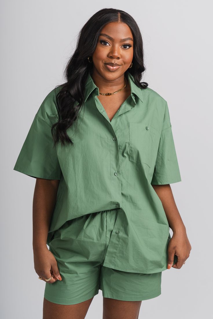 Oversized short sleeve button up top green - Trendy Top - Cute Loungewear Collection at Lush Fashion Lounge Boutique in Oklahoma City Green Cotton Short Top, Green Buttoned Tops For Loungewear, Casual Tops With Buttons Short, Casual Short Tops With Buttons, Green Short Tops For Day Out, Spring Short Tops With Button Closure, Short Green Tops For Day Out, Short Spring Tops With Button Closure, Green Short Sleeve Shirt With Buttons For Spring