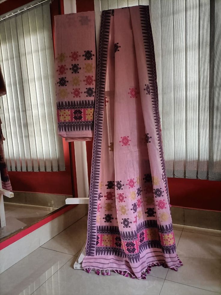 Welcome to our shop, where we take pride in offering you the finest craftsmanship and exquisite textiles. Introducing our pure Muga silk Mekhela Chador, a timeless masterpiece that beautifully combines tradition and elegance. Handwoven with care and precision, this Mekhela Chador is crafted from pure Muga silk, sourced from the silkworm Antheraea assamensis, which is indigenous to Assam, India. Muga silk is known for its lustrous golden hue, unparalleled sheen, and incredible durability. It is c Traditional Pink Slub Silk Salwar Kameez, Traditional Pink Cotton Silk Kurta, Traditional Pink Slub Silk Set, Pink Slub Silk Traditional Set, Bohemian Chanderi Salwar Kameez With Cutdana, Bohemian Cotton Silk Traditional Wear With Dupatta, Bohemian Traditional Wear With Dupatta In Cotton Silk, Traditional Drape Blouse With Woven Motifs, Festive Woven Motifs Blouse