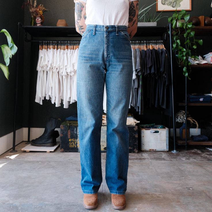 Vintage 70s Levi's Denim Ranch Jeans Medium wash with wear High rise  Straight leg fit  Size: 28" x 33" Model: 5'8" Measurement laid flat - Waist:  14" (across top waistband) - Inseam:  33" (crotch seam to bottom hem) - Rise:  12" (crotch seam to top of waist) - Hips:  18" (straight across below end of zipper) - Thigh:  11.5" (crotch seam to outseam) - Cuff:  9" (lower leg opening) Vintage Relaxed Fit Jeans For Everyday, Vintage Mid-rise Everyday Bottoms, Vintage Style Mid-rise Everyday Bottoms, Vintage Rigid Denim Bottoms For Everyday, Vintage Washed Blue Jeans For Everyday, Vintage Everyday Jeans With Five Pockets, Vintage Relaxed Fit Bottoms For Everyday, Vintage Flare Jeans With Five Pockets For Everyday, Vintage Everyday Flare Jeans With Five Pockets