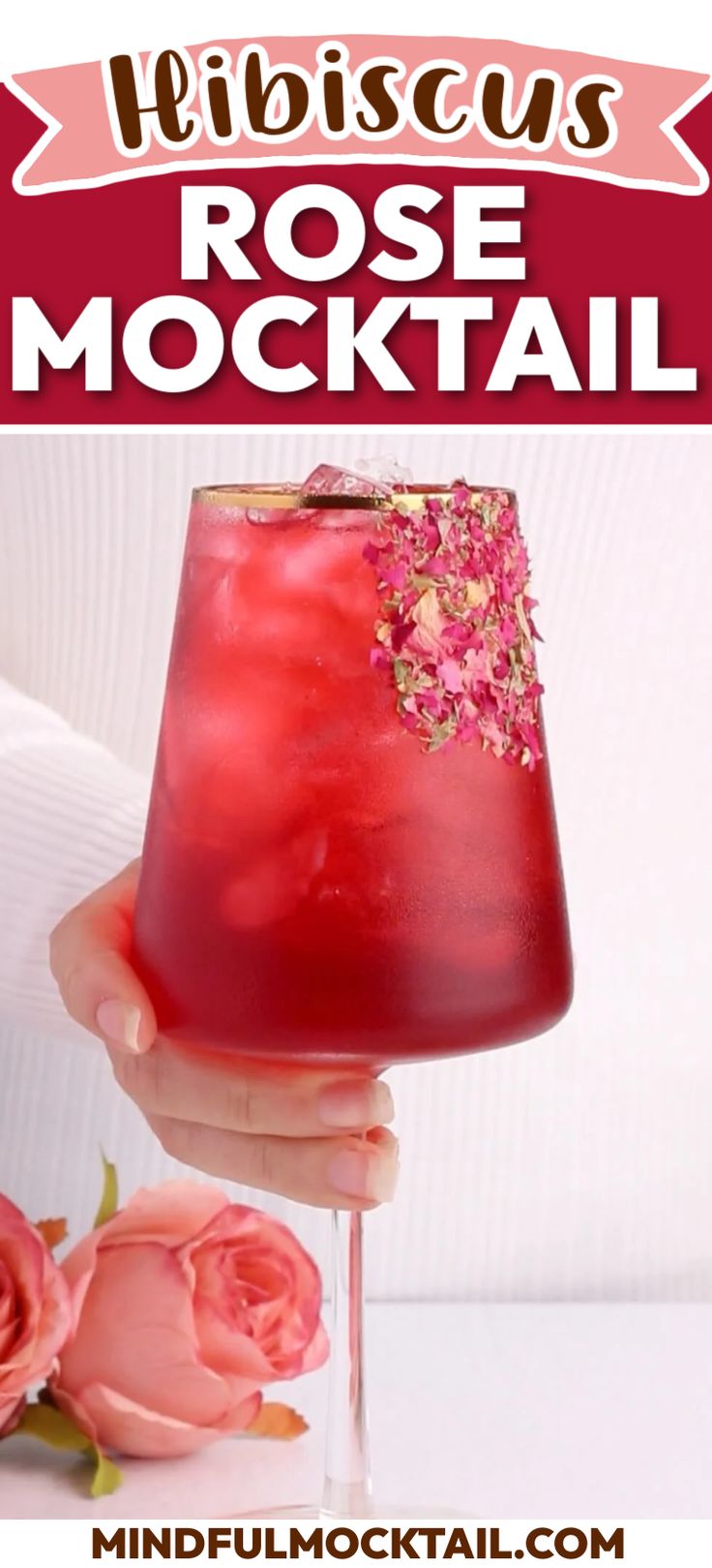 a hand holding a drink with pink flowers around it and the words, fibrocuss rose cocktail