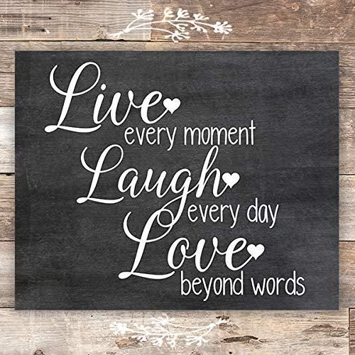 a chalkboard sign that says live every moment laugh every day love beyond words on it