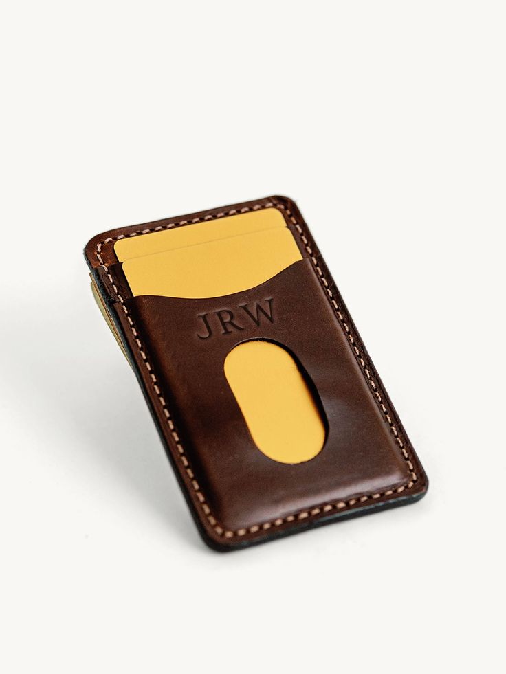 Our Money Clip is the perfect solution for those who want a simple wallet that isn’t too bulky, but is robust enough to hold everything you need— cash included. Featuring two front pockets with integrated thumb slot, a hidden rear pocket for those “always need but rarely use” insurance cards and the like, and the strongest magnets we were able to fit into a wallet of this size. Handcrafted to complement a guy of any age. Premium full-grain leather and robust stitching for many years of service, Functional Card Holder With Hidden Phone Sleeve, Functional Bifold Card Holder For Everyday Use, Functional Wallets With Coin Pocket For Everyday Use, Functional Bifold Card Holder With Card Slots, Brown Wallets With Rfid Blocking For Everyday Carry, Functional Everyday Wallet With Coin Pocket, Brown Rfid Blocking Wallets For Everyday Carry, Brown Rfid Blocking Wallet For Everyday Carry, Functional Wallet With Card Slots