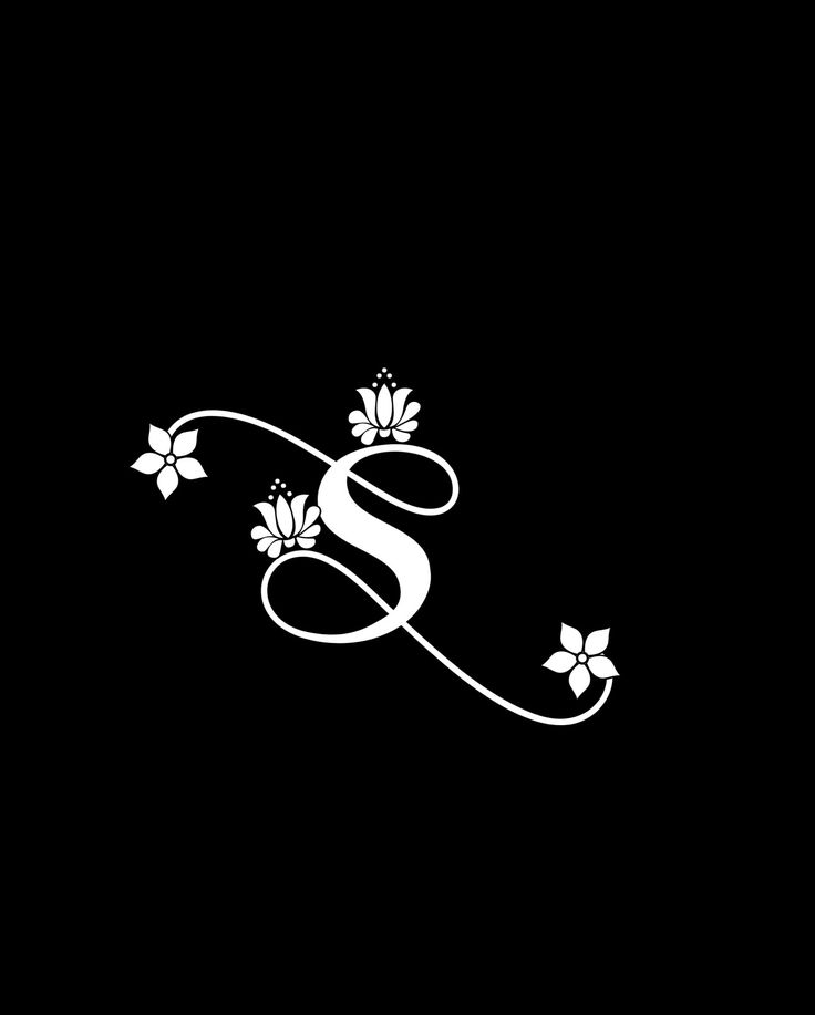 the letter s is decorated with flowers and leaves on a black background, it appears to be an elegant monogram