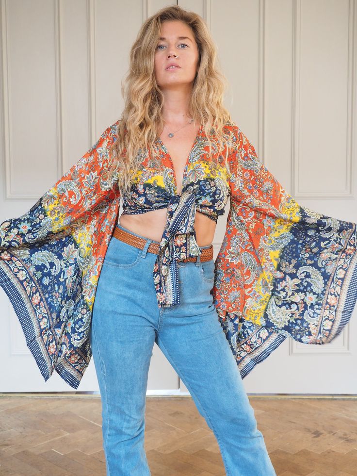 SILK BELL SLEEVE CROP TOP - RAINBOW FIRE SKY ** LIMITED PRINT AVAILABLE **  Handmade recycled silk crop kimono with amazing billowing bell sleeves and gold printed fabric! The gold shimmers and shines, the photos don't do it justice!  This incredible silk crop top is the perfect addition to any outfit, with flowing sleeves and bohemian vibe, this is an amazing bespoke piece to add to any wardrobe!  Our 'Bella' tops were dreamed up in the sunshine and are a twist on our classic 'Stevie' tops and Vintage V-neck Top With Boho Print, Spring Vacation Top With Vintage Print, Spring Vacation Tops With Vintage Print, Spring Vacation Vintage Print Tops, Multicolor Floral Print Top With Kimono Sleeves, Multicolor Vintage Print Tops For Vacation, Multicolor Vintage Print Vacation Tops, Multicolor Tops With Vintage Print For Vacation, Multicolor Vacation Tops With Kimono Sleeves