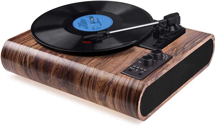 an old fashioned record player with vinyl on it's wooden stand, isolated against a white background