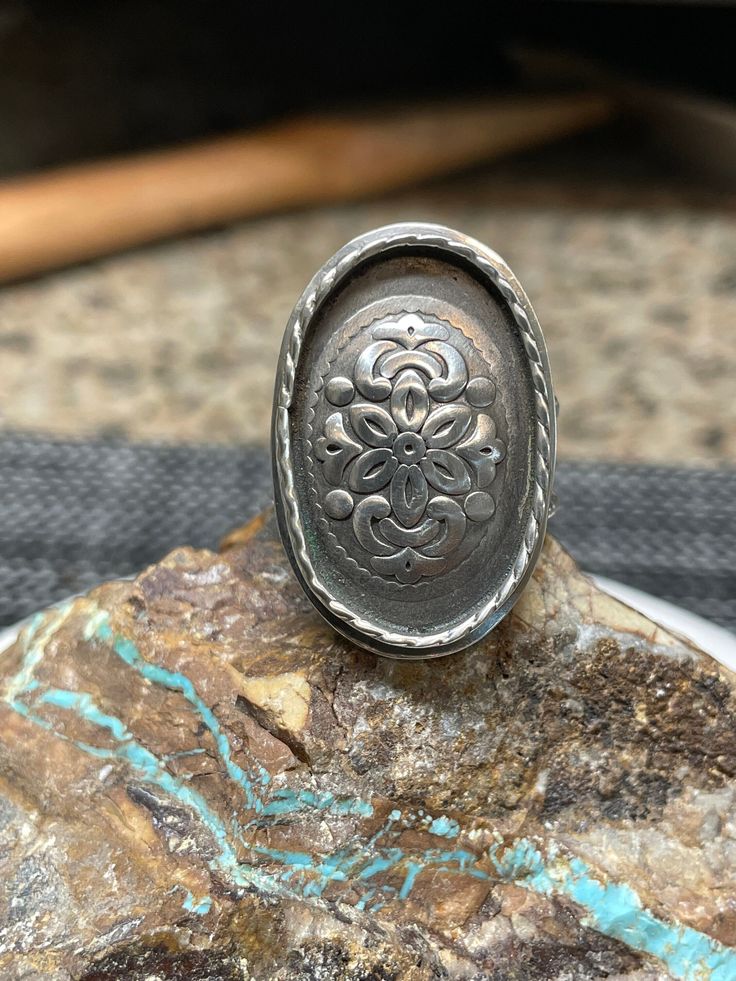 This ring is heavy and substantial, but because of the tapered band, it is comfortable to wear. Artisan Oval Engraved Ring, Artisan Silver Ring With Concho, Unique Stamped Oval Ring, Vintage Silver Concho Ring, Cha Ching, Bling Bling, Rings Statement, Emboss, Statement Rings