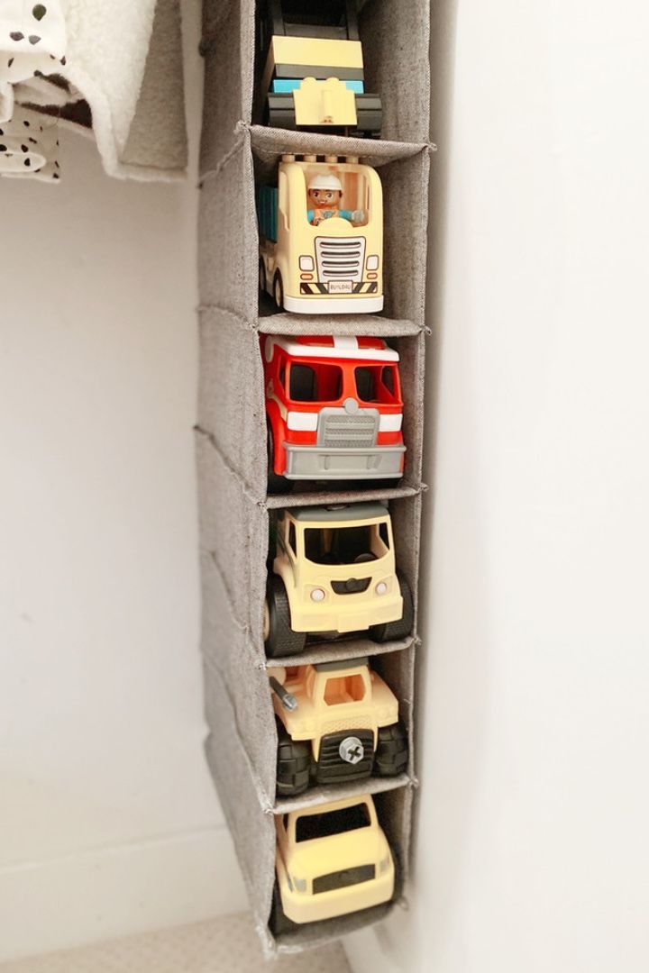 By request, I’ve rounded up my most popular and most pinned organizing hacks on the blog — including the best way to store all of those big toy trucks!

Head over to the blog to learn HOW and WHY they work so well! White Basement, Toy Room Organization, Ideas Habitaciones, Cave Basement, Knee Wall, Boys Playroom, Toddler Playroom, Big Kids Room, Toddler Boys Room