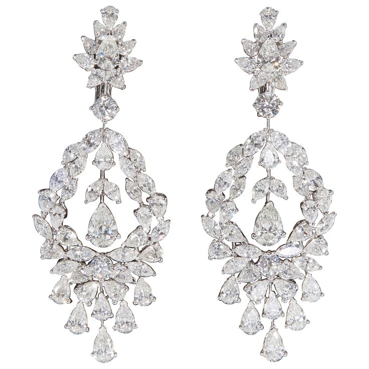 Beautiful diamond drop earrings in a stunning design. 22.05 carats of diamonds, the center pear shape drops measure as carat sizes. 18k white gold Approximately 2.63 inches in length, an inch wide at its widest point. Made in New York Argentium Silver Jewelry, Diamond Chandelier Earrings, Diamond Chandelier, Earrings Diamond, Vs Diamond, Earrings 3, Diamond Drop Earrings, Diamond Drops, Van Cleef