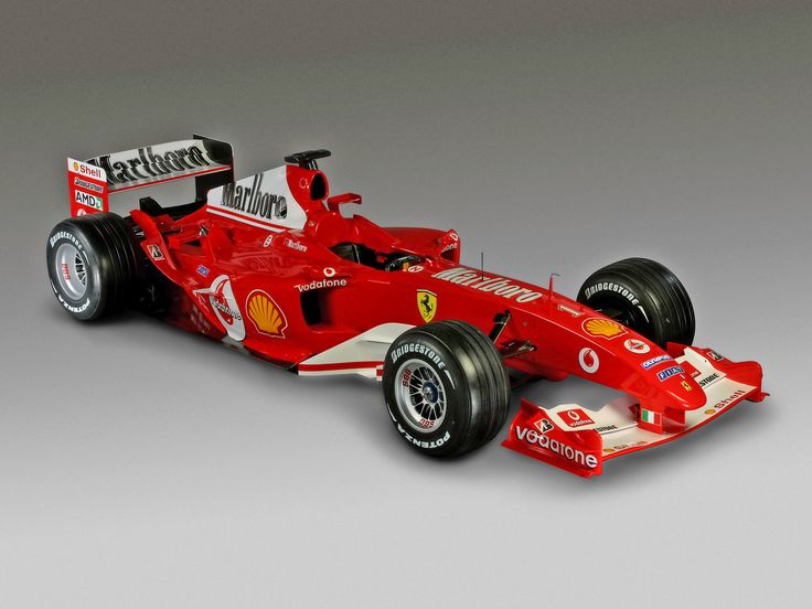 a red race car on a gray background